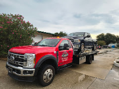 Almighty Towing Transport logo