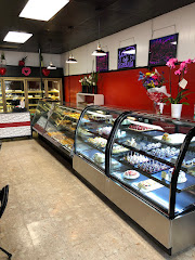 Café Esmeralda Cakes & Bakery logo