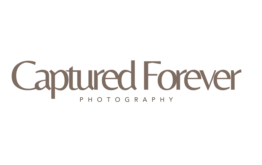 Captured Forever Photography logo
