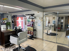 Carlos's Beauty Salon logo