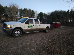 Elisha Junk Removal & Demolition LLC logo