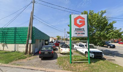 George's Auto Center logo