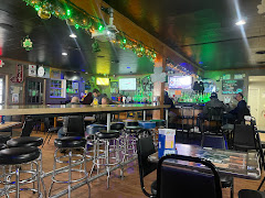 Hecks Bar Carrollton logo