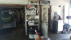 Kenny's Mower Repair logo