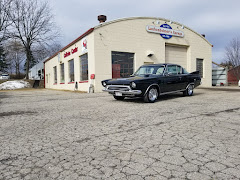 Laubenheimer's Garage Collision Center logo