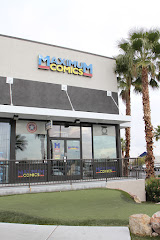 MaximuM Comics logo