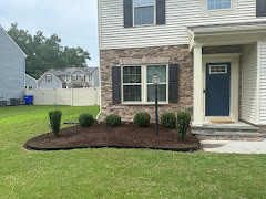 MJ Landscaping And Design LLC. logo
