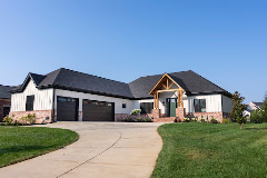 P.L. Lyons Architectural Builders logo