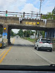 Penny the Truck Eating Bridge logo