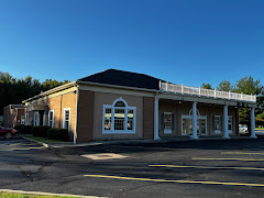 Russell Real Estate Services - Westlake Office logo
