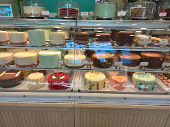 SusieCakes - Austin West 6th Street logo