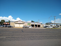 Tam's Auto Repair logo