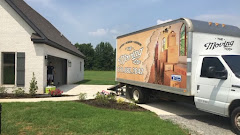 The Moving Company logo