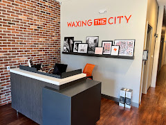 Waxing the City logo