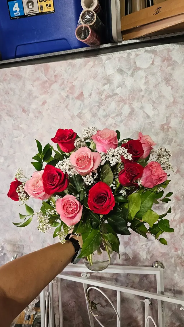 Customer photo of work by Maggie May Flowerz, from Q King's review