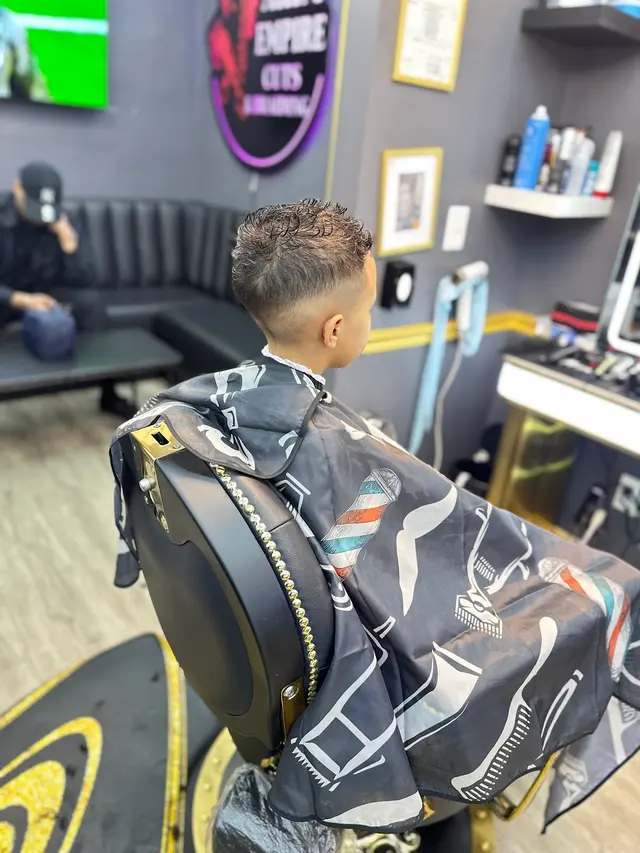 Akim’s Empire Cuts & Braiding barber shop — photo from the business 10