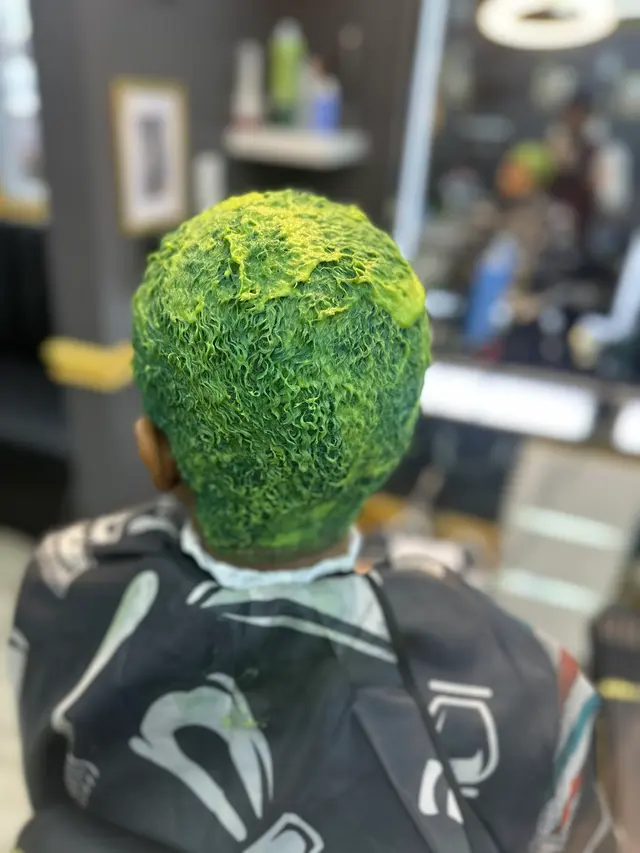 Akim’s Empire Cuts & Braiding barber shop — photo from the business 11