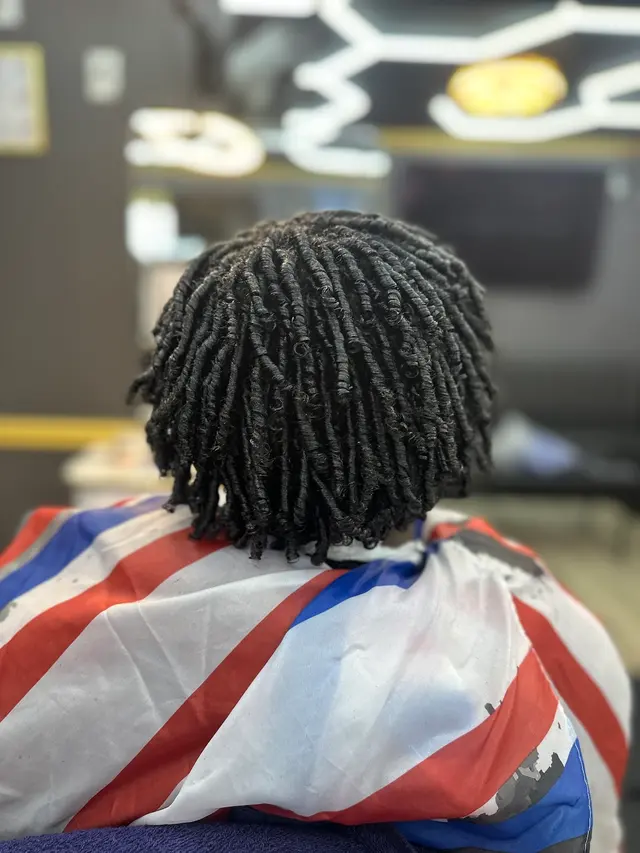 Akim’s Empire Cuts & Braiding barber shop — photo from the business 8