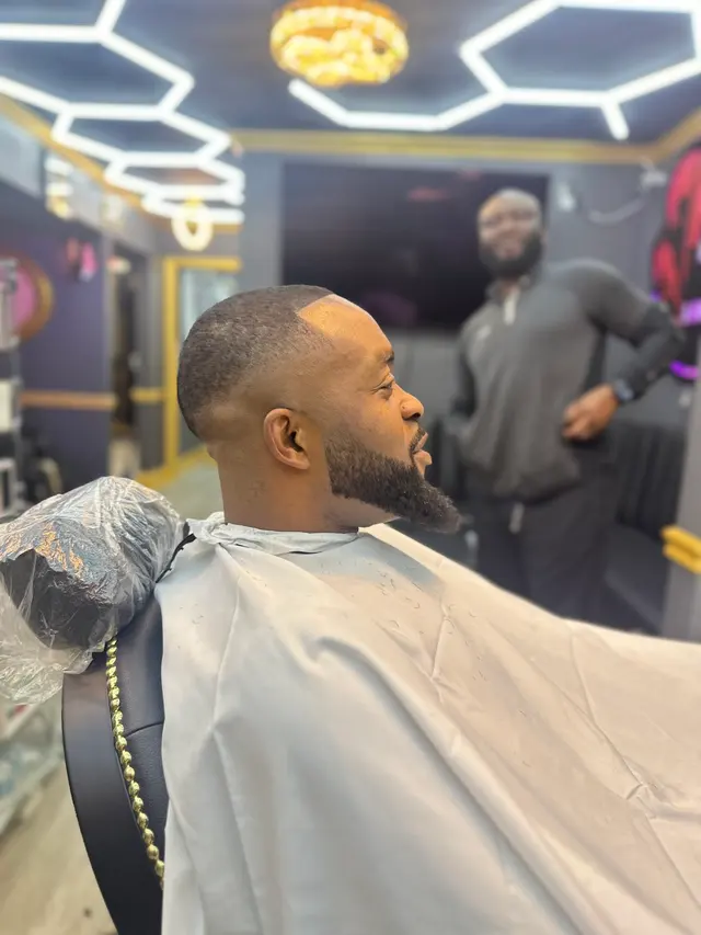 Akim’s Empire Cuts & Braiding barber shop — photo from the business 1