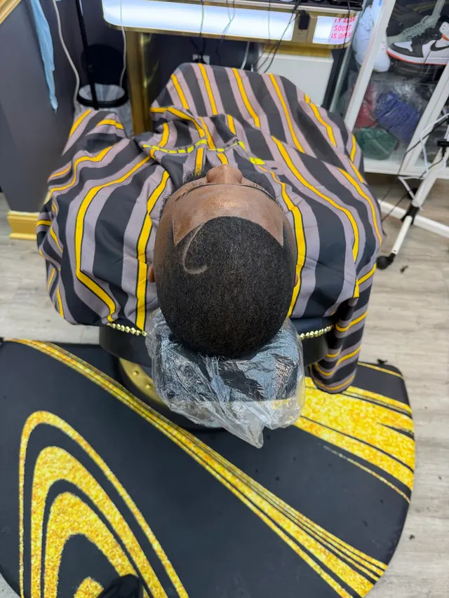 Akim’s Empire Cuts & Braiding barber shop — photo from the business 2