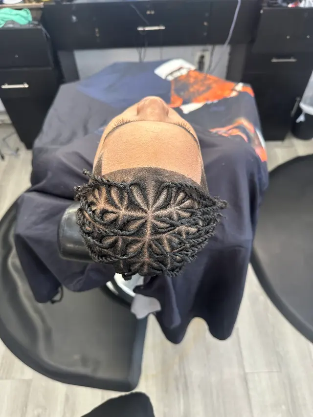 Akim’s Empire Cuts & Braiding barber shop — photo from the business 9