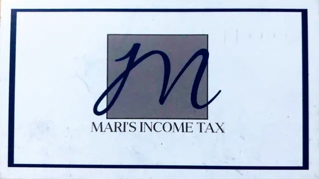 MARI'S INCOME TAX — photo from the business 8