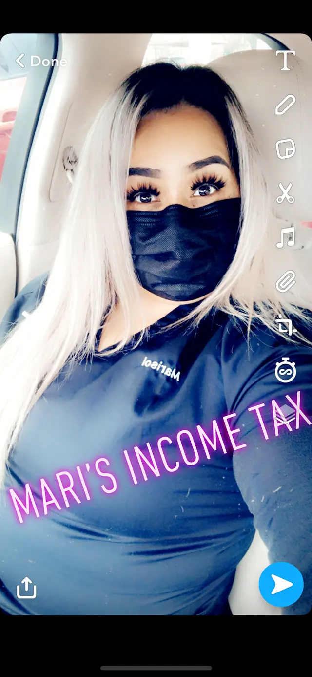 MARI'S INCOME TAX — photo from the business 12