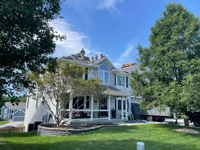 Qualis Roofing & Construction — photo from the business 9