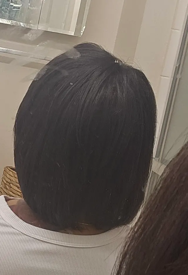 Customer photo of work by The Shampoo Bowl Hair and Nail Salon, from Marchelle Brooks's review