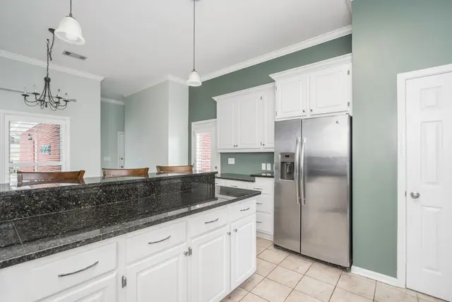 Terra Jorgensen, AT Home affiliated with KW — photo from the business 9