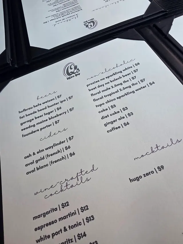 Customer photo of work by Q's Wine Bar, from Ro Indy Realtor's review