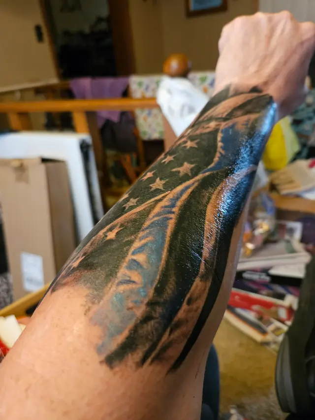 Customer photo of work by Holy Tattoos, from Marc Johnson's review