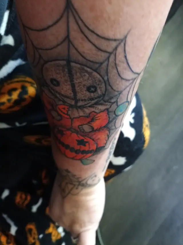 Customer photo of work by Sideshow Tattoo and Piercing, from Lacy Chapman's review