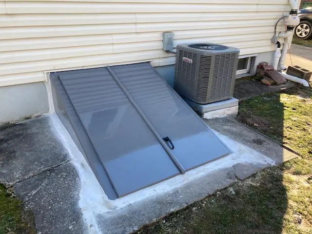 Glazed Cellar Doors by Confident Home Remodelers — photo from the business 1